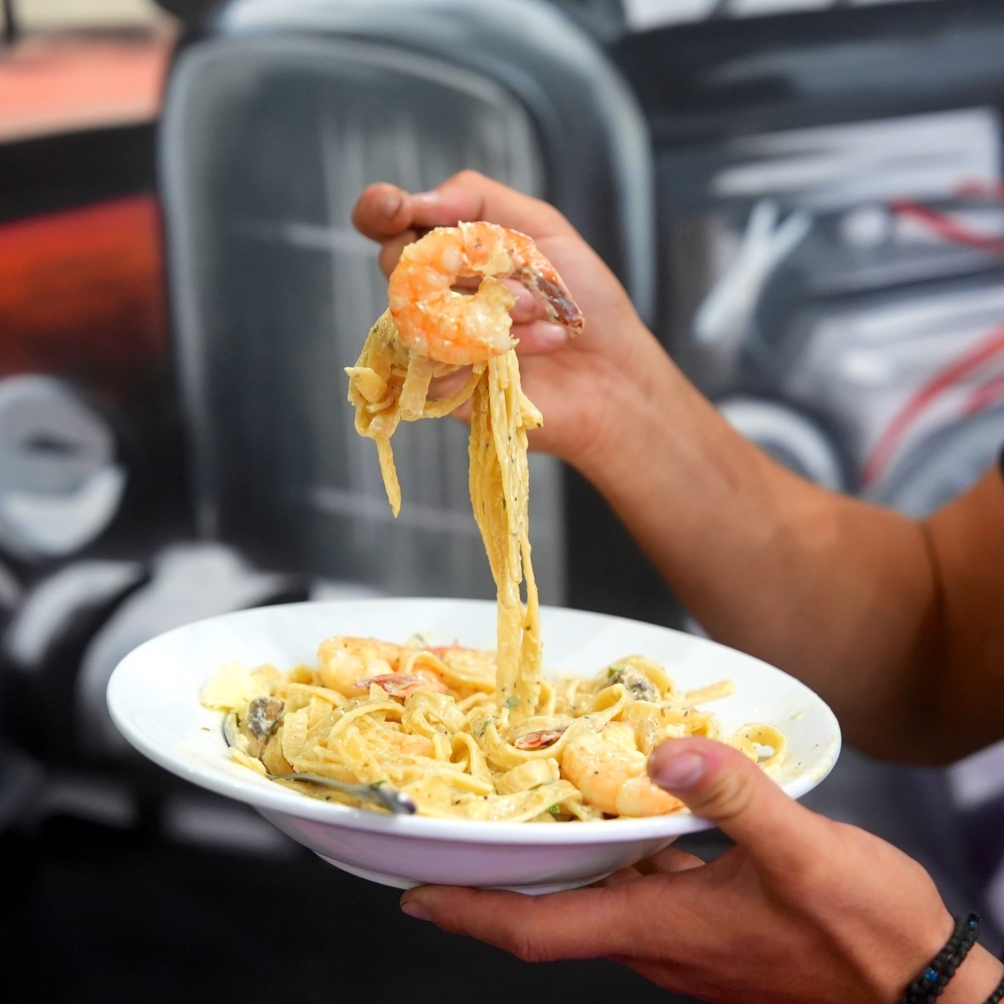 Prawn pasta served table-side